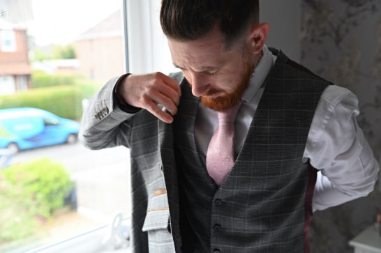 A groom getting ready 