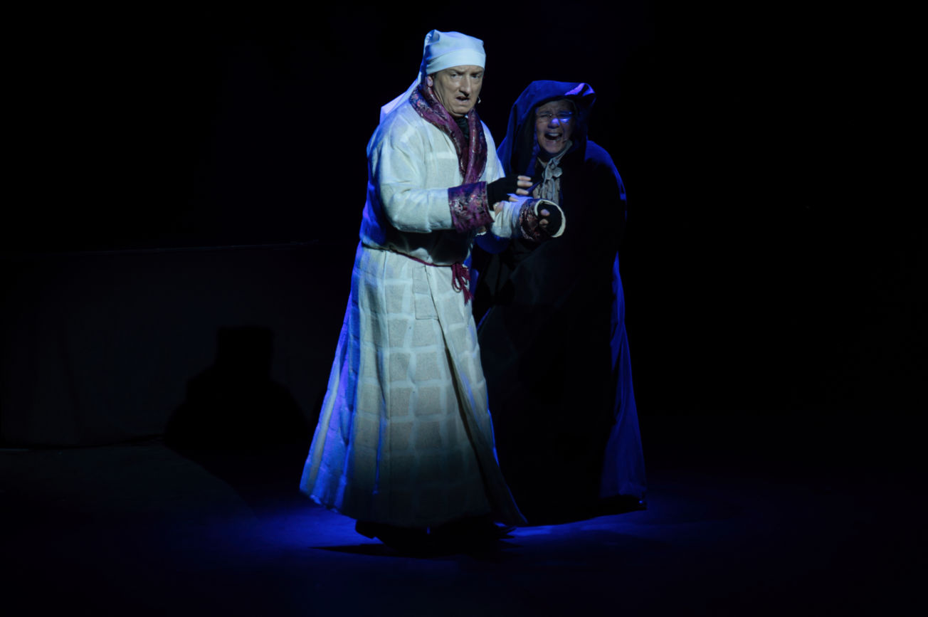 man on stage in Theatre stage show 